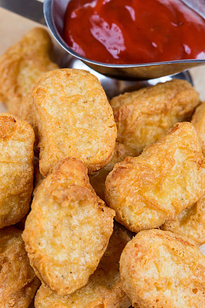 istock fast food fresh hot chicken nuggets with ketchup 508672145