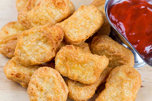 istock fast food fresh hot chicken nuggets with ketchup 508672195