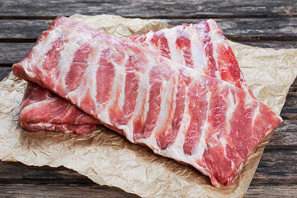 istock Raw Pork ribs. on crumpled paper 508695254