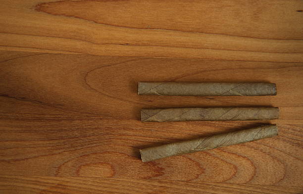 istock tobacco on wood background 508697324