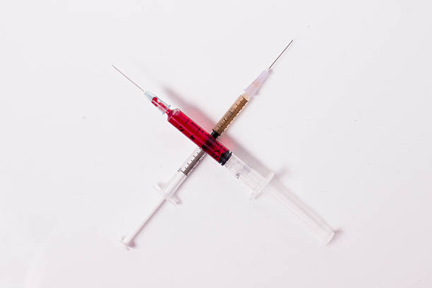istock blood and vaccine in syringe isolated 508698776