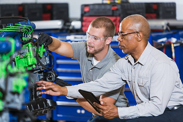 istock Vocational class, learning to repair diesel engine 508700982