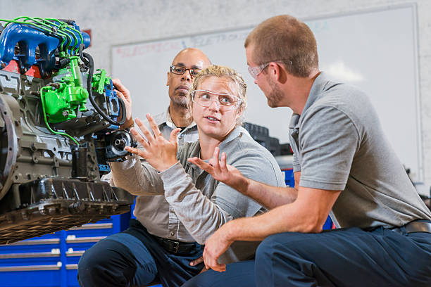 istock Vocational class, learning to repair diesel engine 508701386