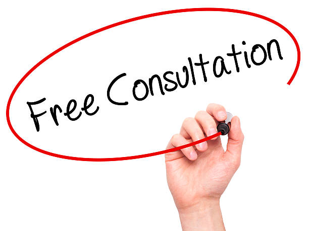 istock Man Hand writing Free Consultation with black marker 508701908