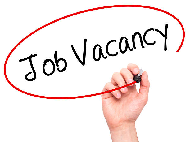 istock Man Hand writing Job Vacancy with marker on visual screen 508701950