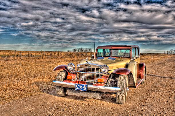 istock HDR Old Antique Car on farm 508702607