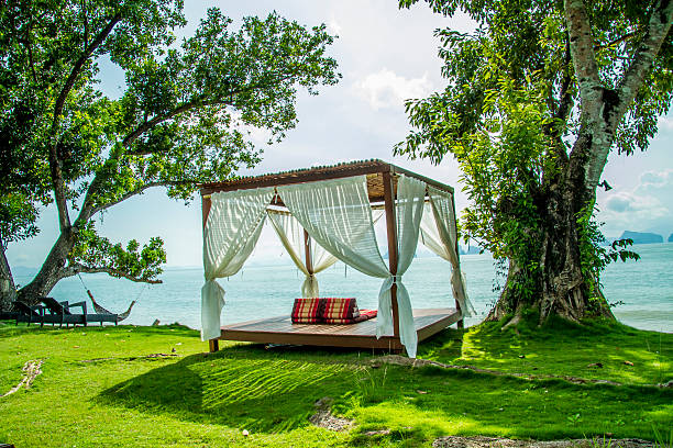istock Luxurious bed by the sea, the beach to relax 508704155