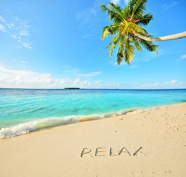 istock Relax word written on the tropical beach 508704748