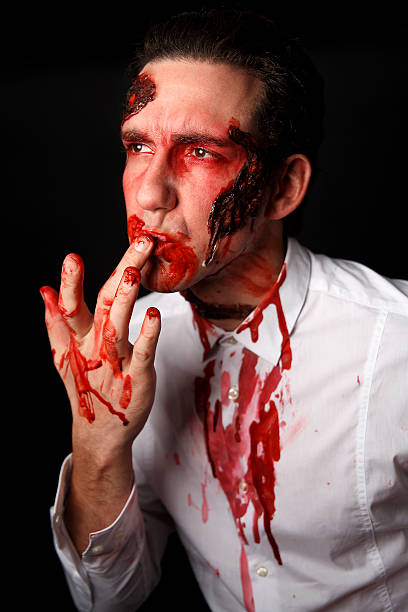 istock Psychopath with bloody fingers 508705125