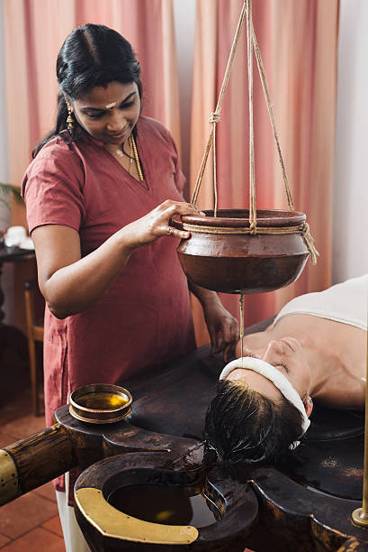 istock Ayurvedic shirodhara treatment in India 508705352