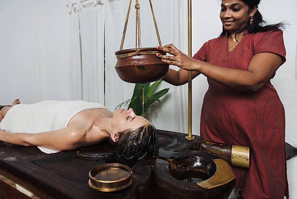 istock Ayurvedic shirodhara treatment in India 508705710