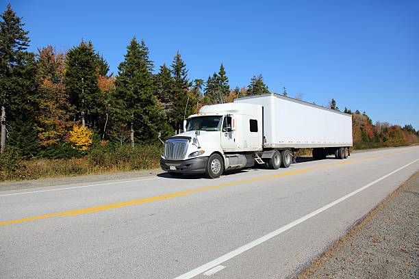 istock Semi truck being driven on a highway 508706402