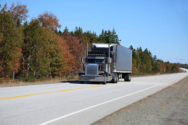 istock Semi truck being driven on a highway 508706842