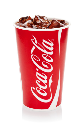 Tallinn. Estonia - August 16, 2014: Coca-Cola with ice cubes in original cup.