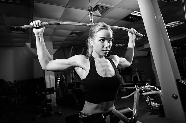 istock Young muscular woman doing workout 508709436