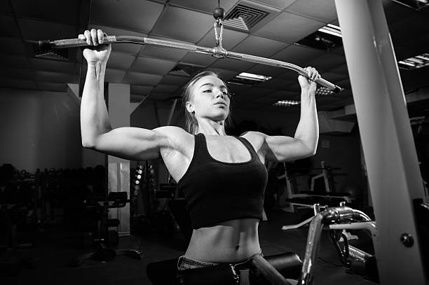 istock Young muscular woman doing workout 508709510