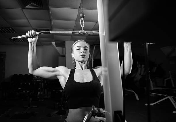 istock Young muscular woman doing workout 508709544
