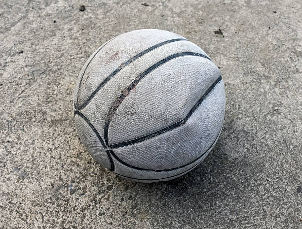 istock old basketball on the ground 508710650