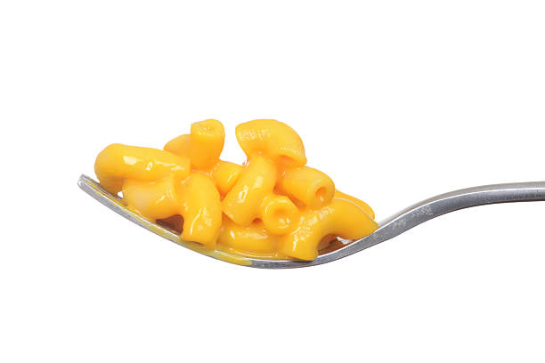 isolated macaroni and cheese on a fork isolated macaroni and cheese on a fork with white background  macaroni stock pictures, royalty-free photos & images