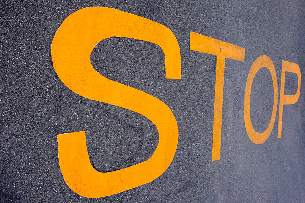 istock Stop sign on the road. 508712396