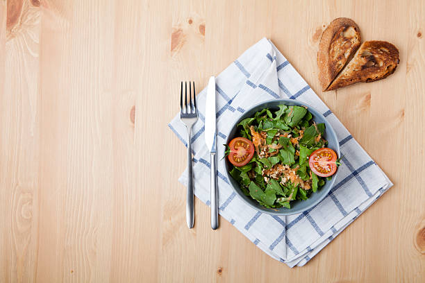 istock Plate with fresh salad, knife and fork. Diet food 508713076