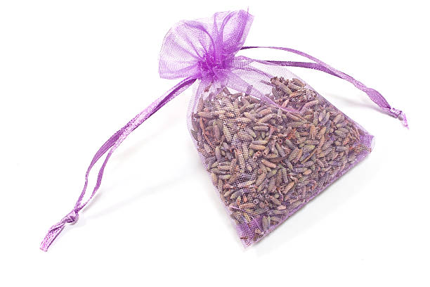 Sachet with dry lavender flowers isolated on white