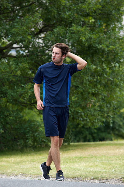 istock Young man jogging outdoors 508725621