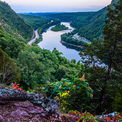 Delaware Water Gap, Pennsylvania. Scenic view from the Mount Tammany to the Delaware River and the Highway 80 with the light's trail, New Jersey.