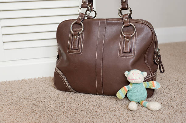 istock Vintage Purse with child's toy 508730873