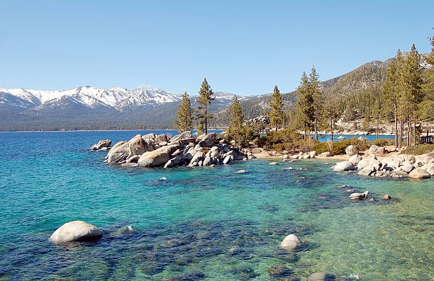 istock Lake Tahoe shore with blue sky and rocks 508746080