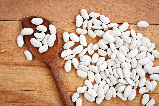 istock White beans on a wooden board 508746230