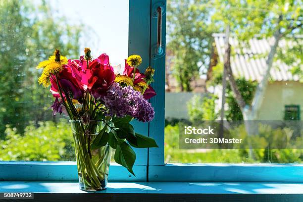 Flowers On The Window Stock Photo - Download Image Now - Blue, Bouquet, Dandelion