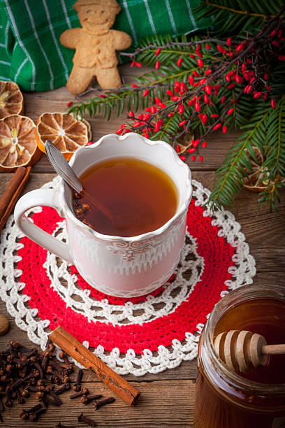 istock Winter hot drink with spices on wooden table. 508751058