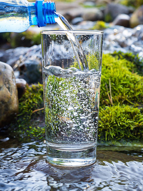 istock Water pouring into a glass from bottle 508751586