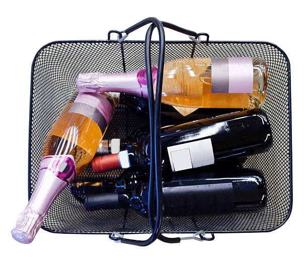 Looking down at isolated wire basket filled with wine and champagne. Horizontal.
