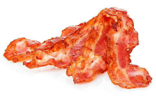 istock Cooked bacon rashers close-up isolated on a white background. 508754866