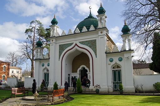 Woking, UK - February 7, 2015:  Visitors at the oldest purpose built mosque in the UK- the Shah Jehan Mosque in Woking, Surrey.  Part of the Visit My Mosque day organised by the Muslim Council of Britain.