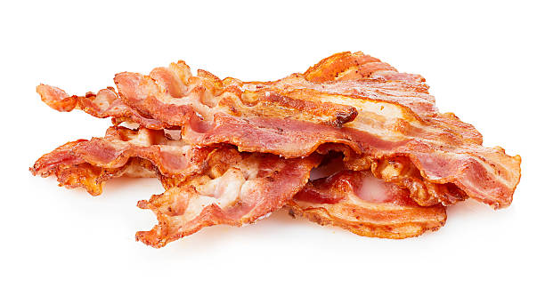 istock Cooked bacon rashers close-up isolated on a white background. 508755226