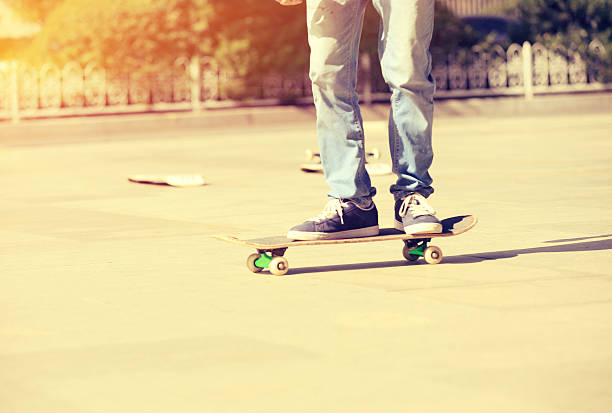 young boy skateboarding in the city