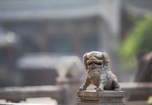 marble lion on handrail