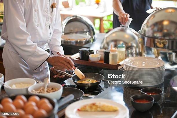 Chef Cooking Eggs Stock Photo - Download Image Now - Chef, Omelet, Preparation