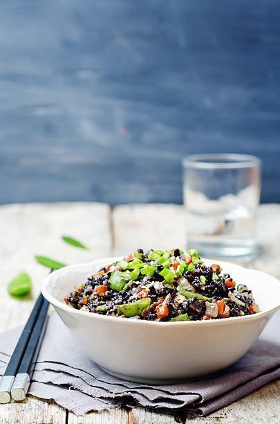 istock Black rice with snap peas and vegetables 508757446