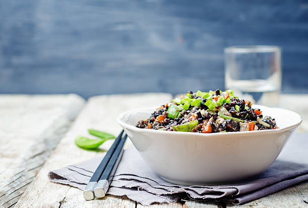 istock Black rice with snap peas and vegetables 508757518