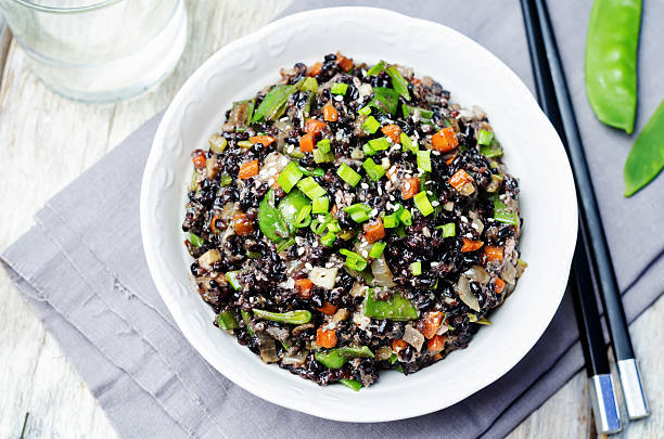 istock Black rice with snap peas and vegetables 508757676