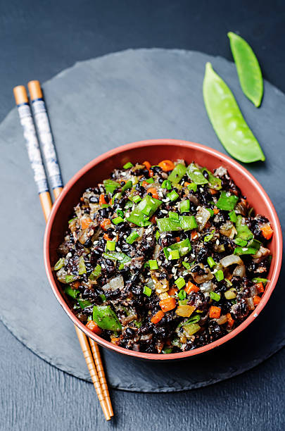 istock Black rice with snap peas and vegetables 508757828
