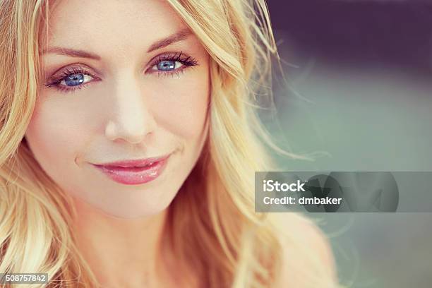 Instagram Style Beautiful Blond Woman With Blue Eyes Stock Photo - Download Image Now