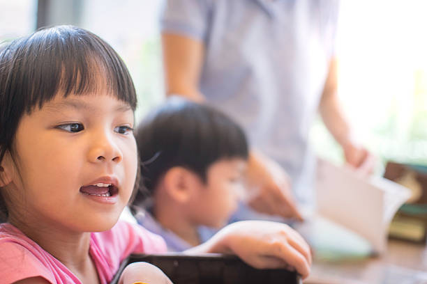 istock Asian Girl in Classroom 508758054