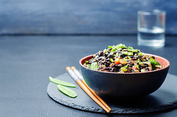 istock Black rice with snap peas and vegetables 508758290