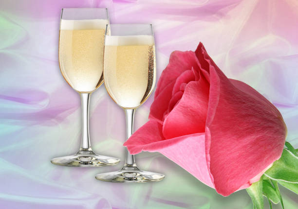 istock Pink rose and champagne glasses 508759258
