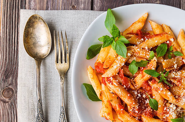istock Penne pasta in tomato sauce 508759726